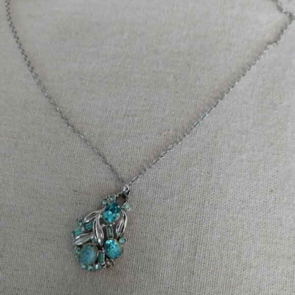 Jewelry - Silver tone and blue rhinestone pendant and chain necklace.
